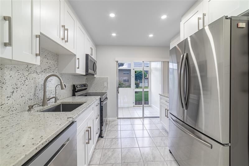Property Photo:  600 NW 80th Ave 105  FL 33063 
