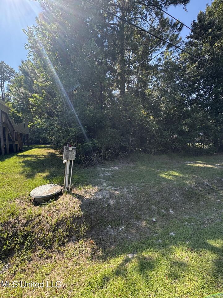 Property Photo:  7111 Sunflower Street  MS 39520 