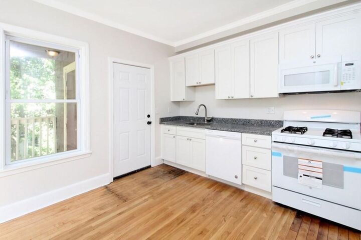 Property Photo:  45-45A Spencer St  MA 02124 