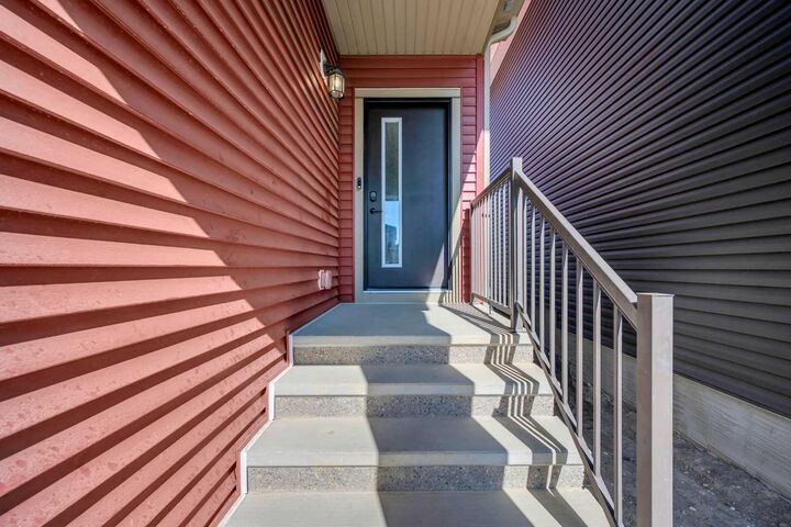 Property Photo: 154 Silver Spruce Grove SW AB T2X 5M2