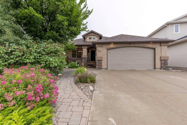 Property Photo: 359 Mt Sunburst Way W AB T1K 3J9
