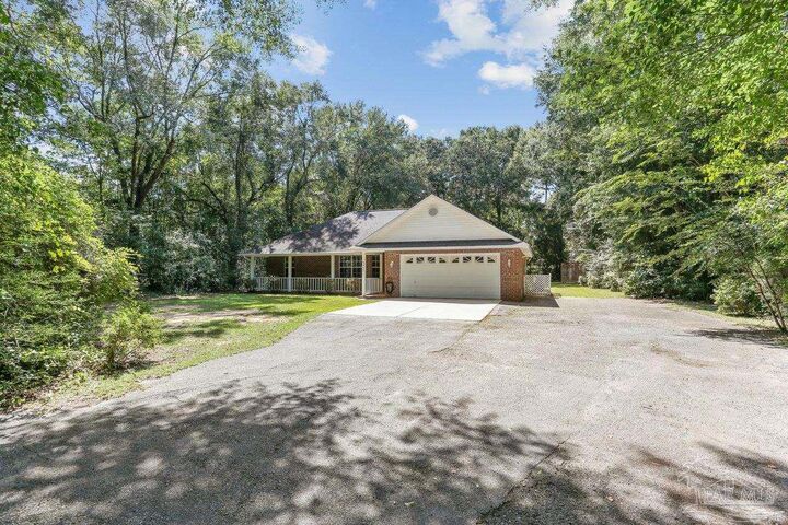 Property Photo:  5957 Wyndi Way  FL 32571 