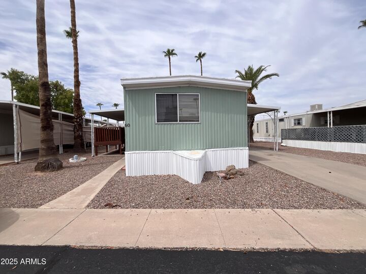 Property Photo:  9501 E Broadway Road 60  AZ 85208 
