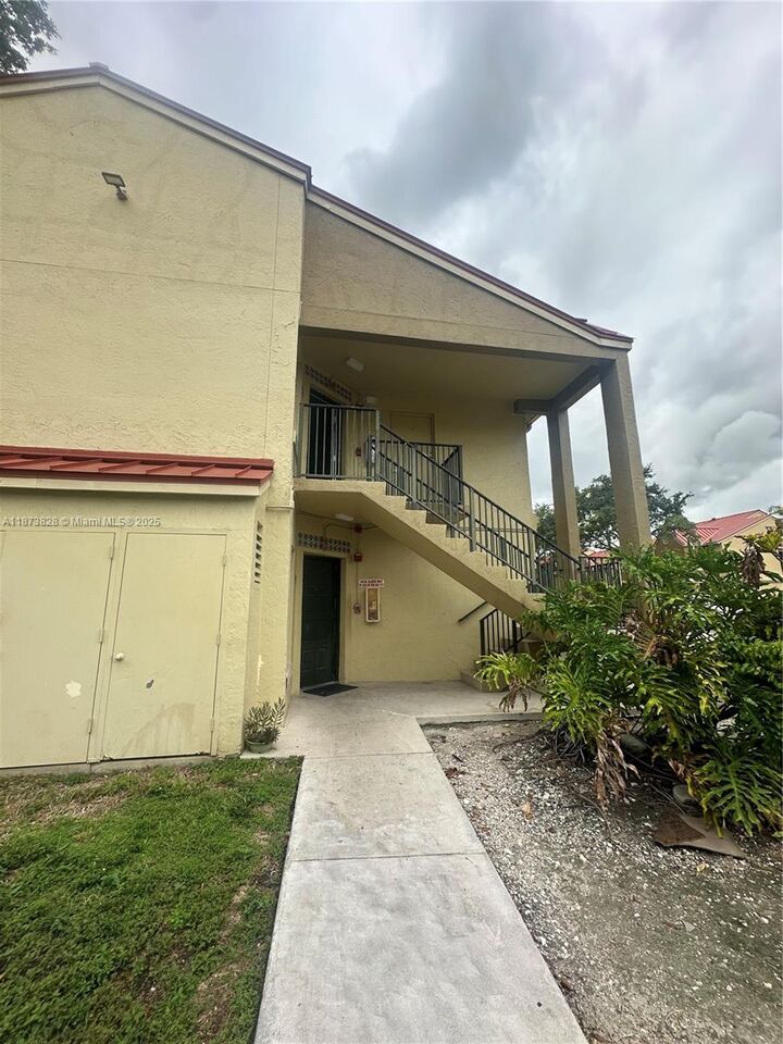 Property Photo:  18318 NW 68th Ave B  FL 33015 