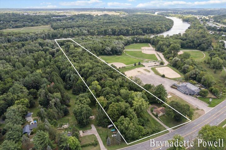 Property Photo:  5788 W River Road  MI 49306 