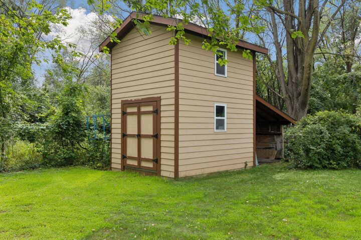 Property Photo:  9217 W River Road  MN 55444 