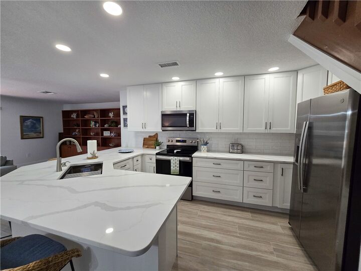 Property Photo: 4949 N Highway A1a 204 FL 34949