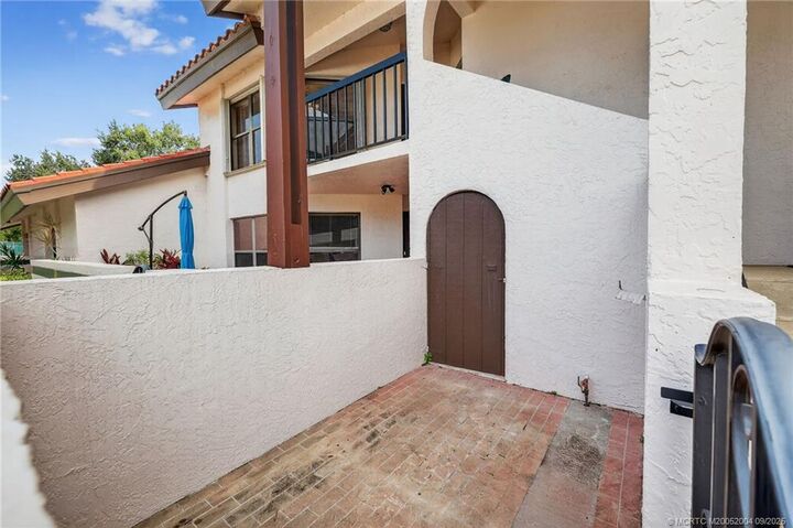 Property Photo:  6110 SE Martinique Drive 201  FL 34997 