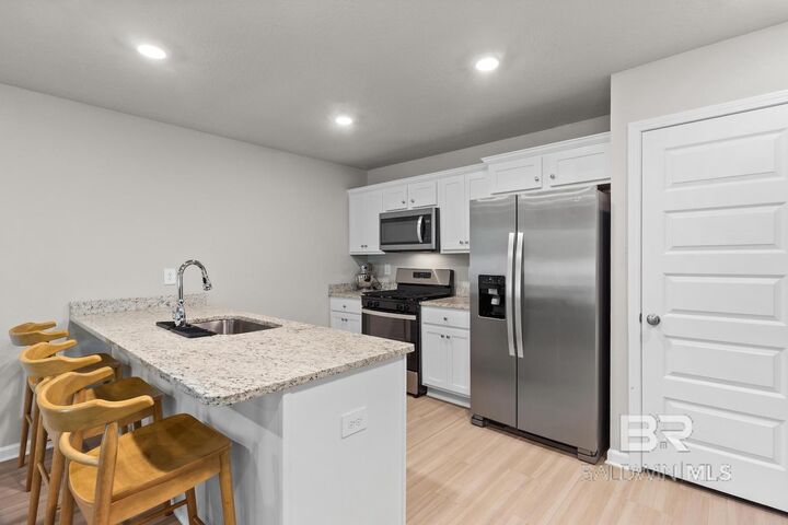 Property Photo: 2606 E Windmere Drive AL 36575