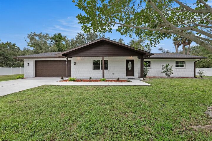 Property Photo:  6103 Palm Avenue  FL 33534 
