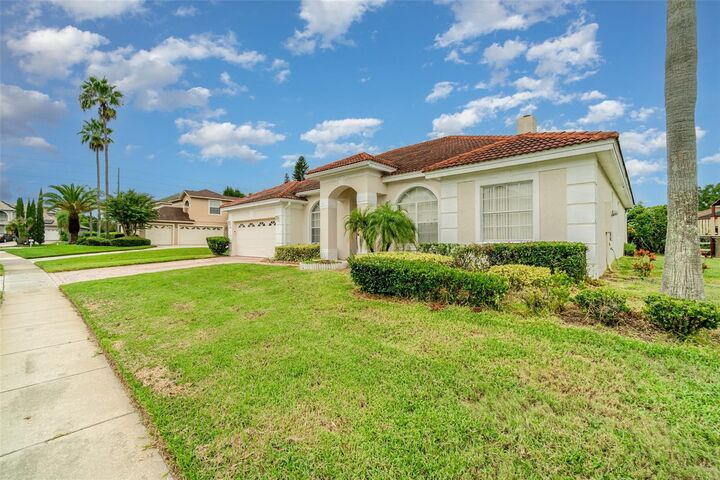 Property Photo: 8603 Wild Cherry Court FL 32836