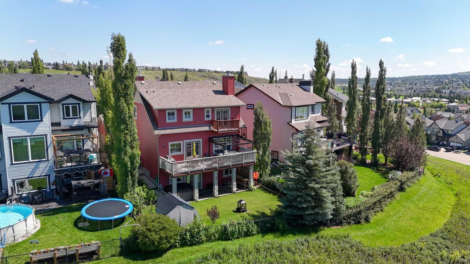 Property Photo: 122 Hidden Creek Heights NW AB T3A 6K9