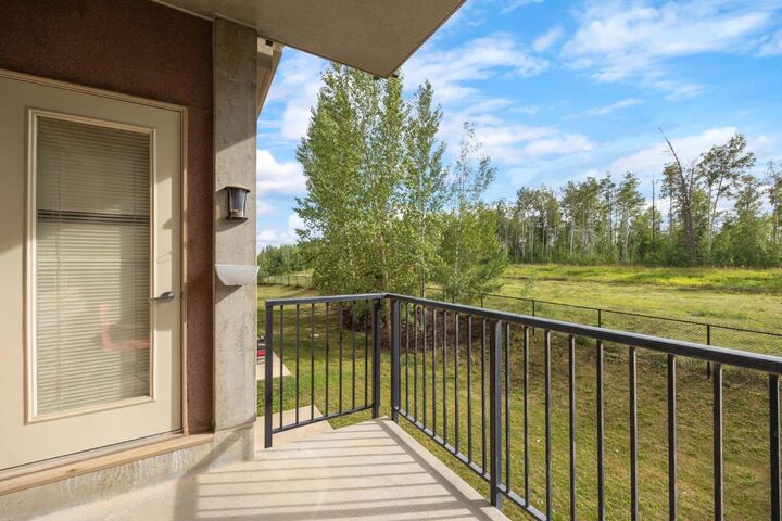 Property Photo: 204 Sparrow Hawk Drive 2209 AB T9K 0P1