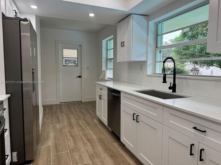 Property Photo:  370 NW 43rd Ave  FL 33317 