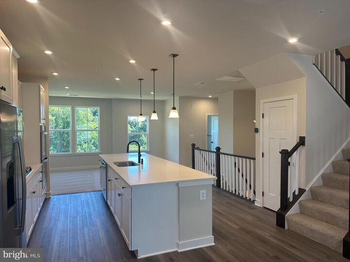 Property Photo:  228 Matisse Place 1012B  MD 20716 