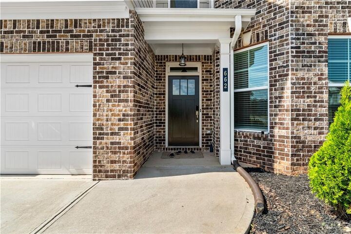 Property Photo:  662 Eagles Nest Circle  GA 30011 