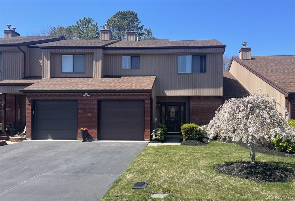Property Photo: 22 Timber Ridge Drive NY 11741
