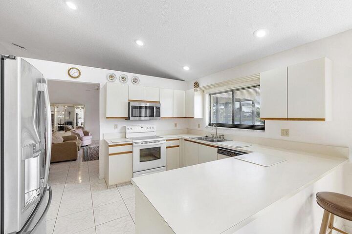 Property Photo:  9525 El Clair Ranch Rd Road  FL 33435 