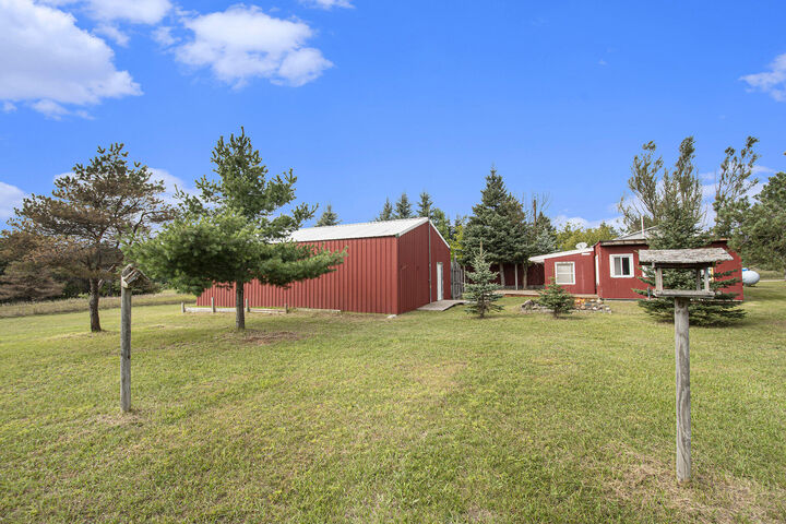 Property Photo:  309 Creekside Drive  MI 49755