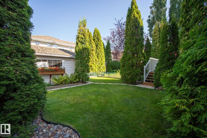Property Photo:  11570 13 Avenue NW  AB T6J 7B3 