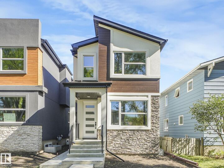 Property Photo:  10963 129 Street NW  AB T5M 0Y2 
