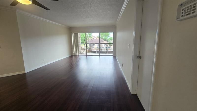Property Photo:  8871 Wiles Road 202  FL 33067 