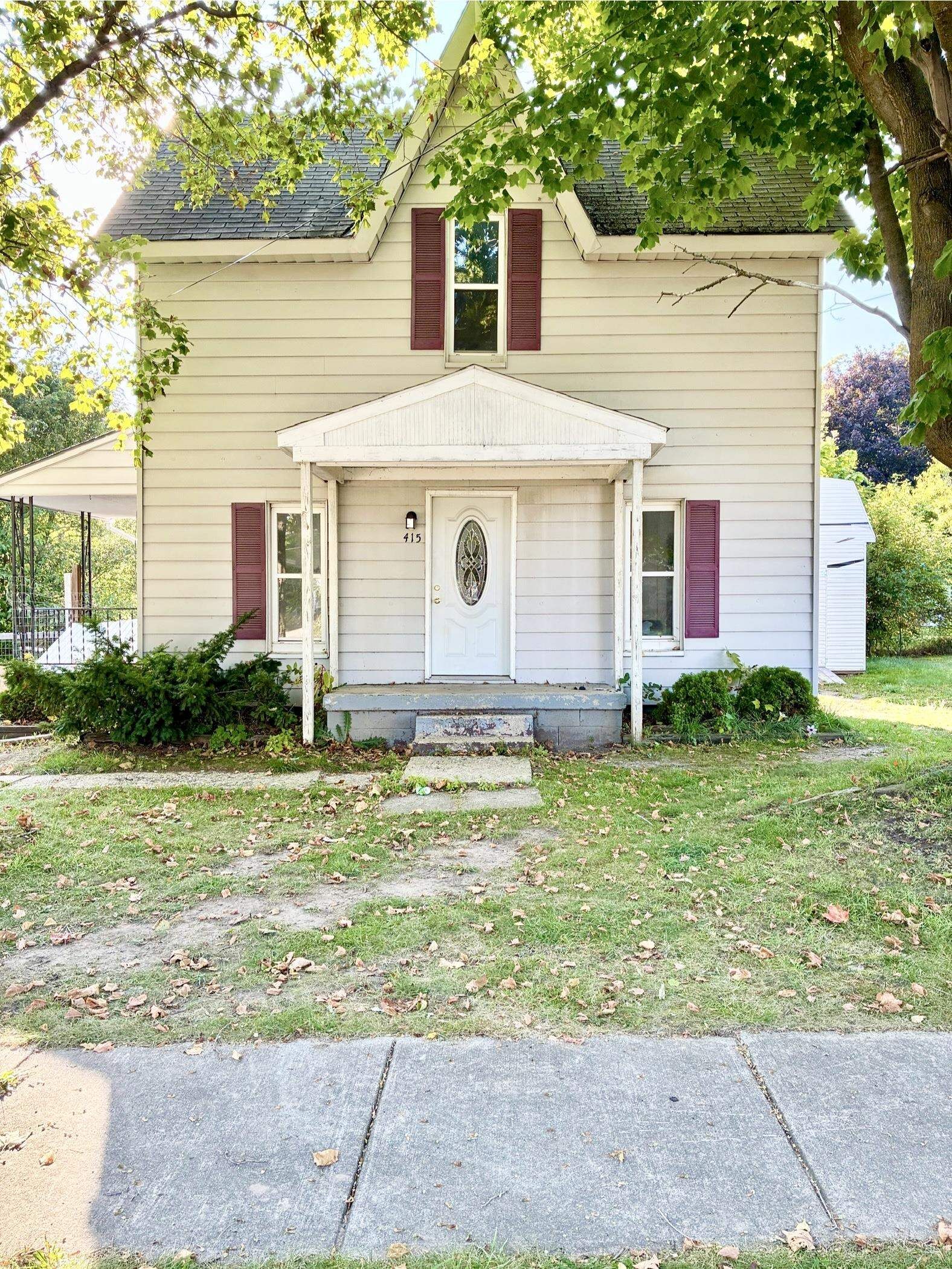 Property Photo:  415 Dimmick Street  MI 48867 
