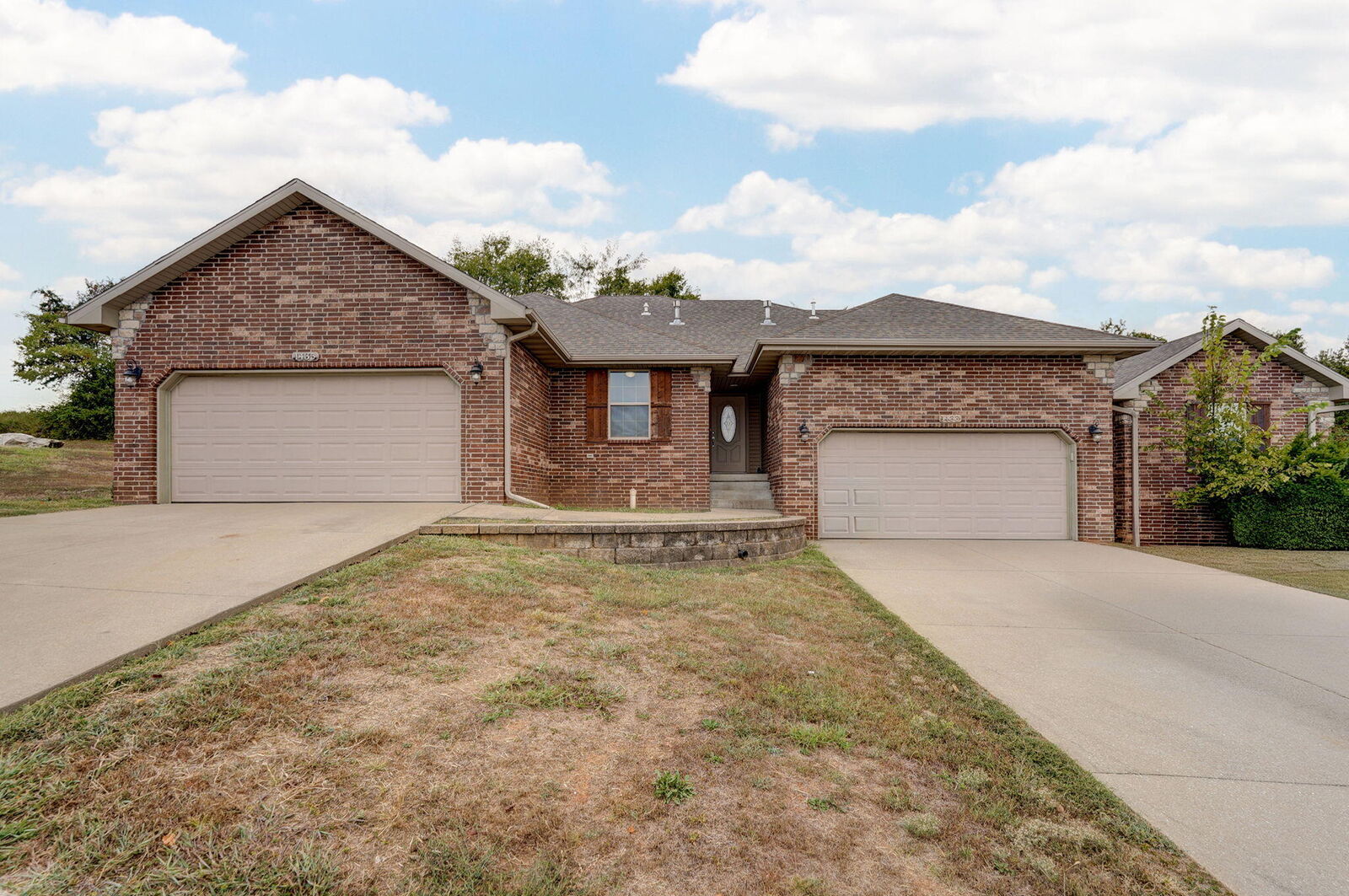 Property Photo:  1433-1435 S Atlas Court  MO 65721 