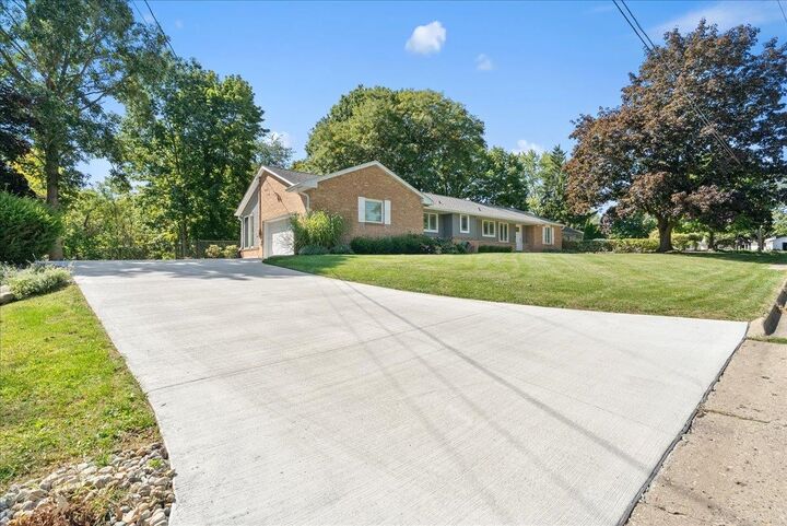 Property Photo: 1104 Riverside Drive MI 48867