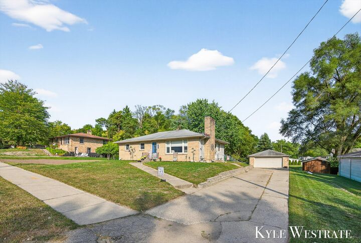 Property Photo: 6026 Belmont Avenue NE MI 49306