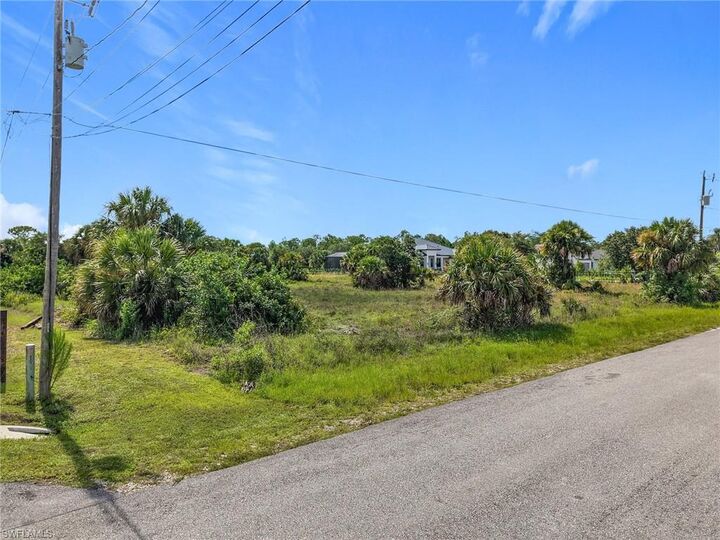 Property Photo:  10th St NE  FL 34120 
