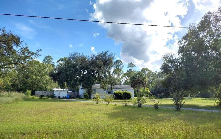 Property Photo: 5952 Elm Avenue FL 32110