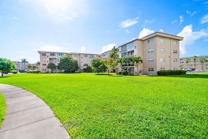 Property Photo:  2615 NE 1st Court 301  FL 33435 