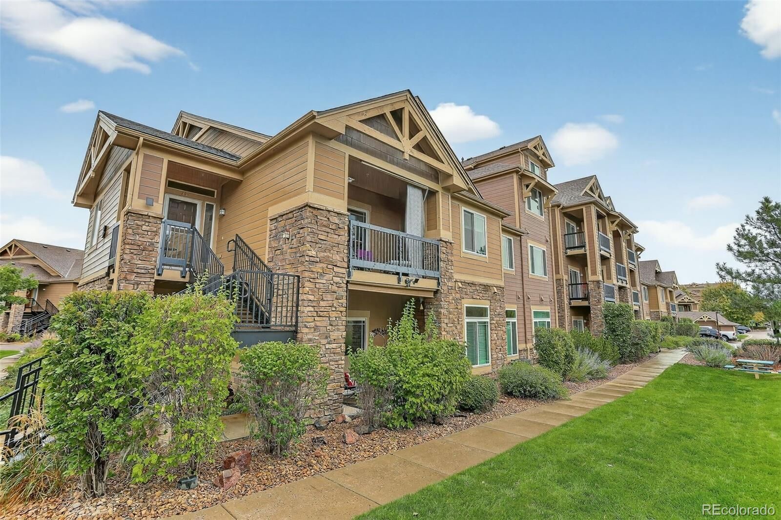 Property Photo: 8779 S Kipling Way 105 CO 80127