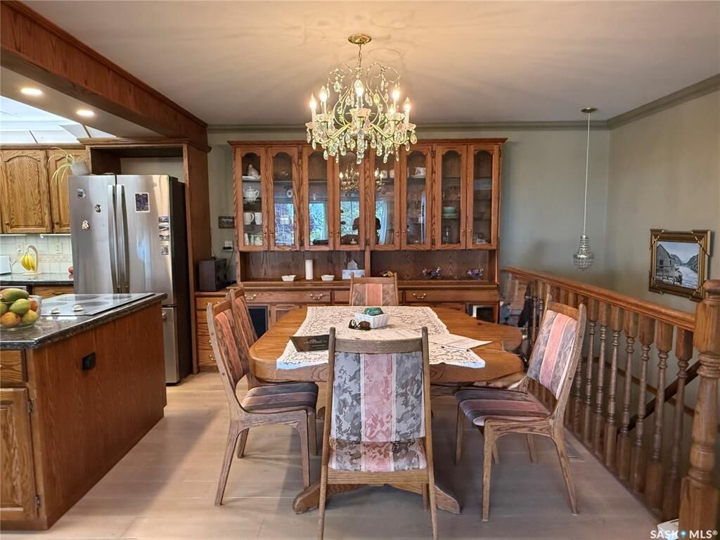 Property Photo:  275 Alpine Crescent 8  SK S9H 4T5 