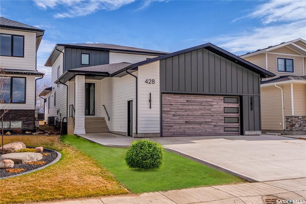 Property Photo:  428 Woolf Bend  SK S7W 1E5 
