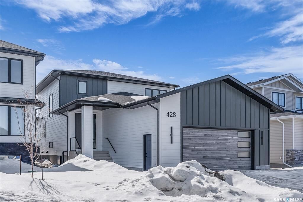 Property Photo: 428 Woolf Bend SK S7W 1E5