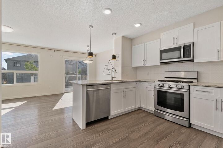 Property Photo:  17629 7A Avenue SW  AB T6W 2W1 
