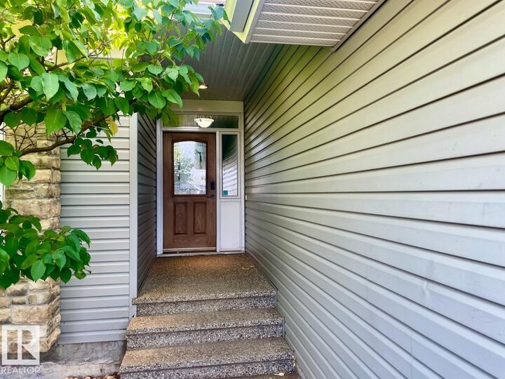 Property Photo:  8711 208 Street NW  AB T5T 6Y2 