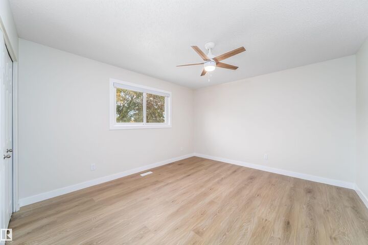 Property Photo: 7115 12 Avenue NW AB T6K 3H6