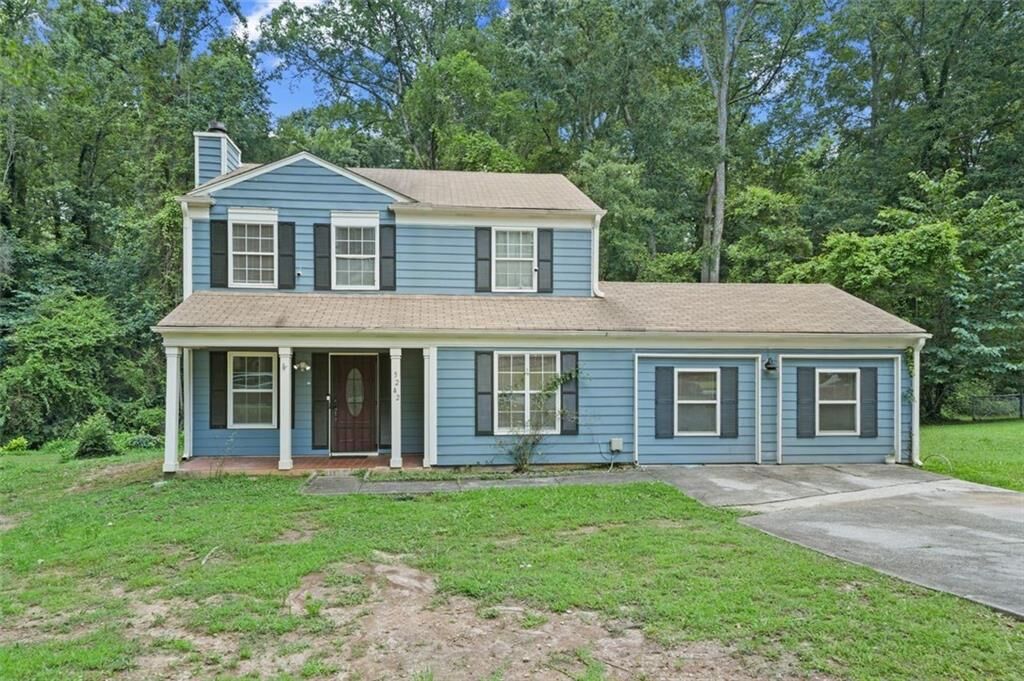 Property Photo:  5242 McCarter Station  GA 30088 