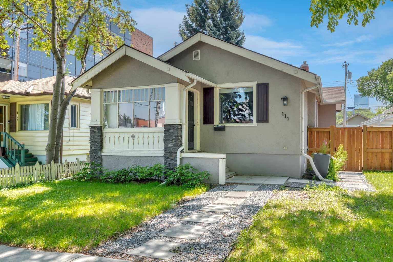 Property Photo:  111 11 Avenue NW  AB T2M 0B7 