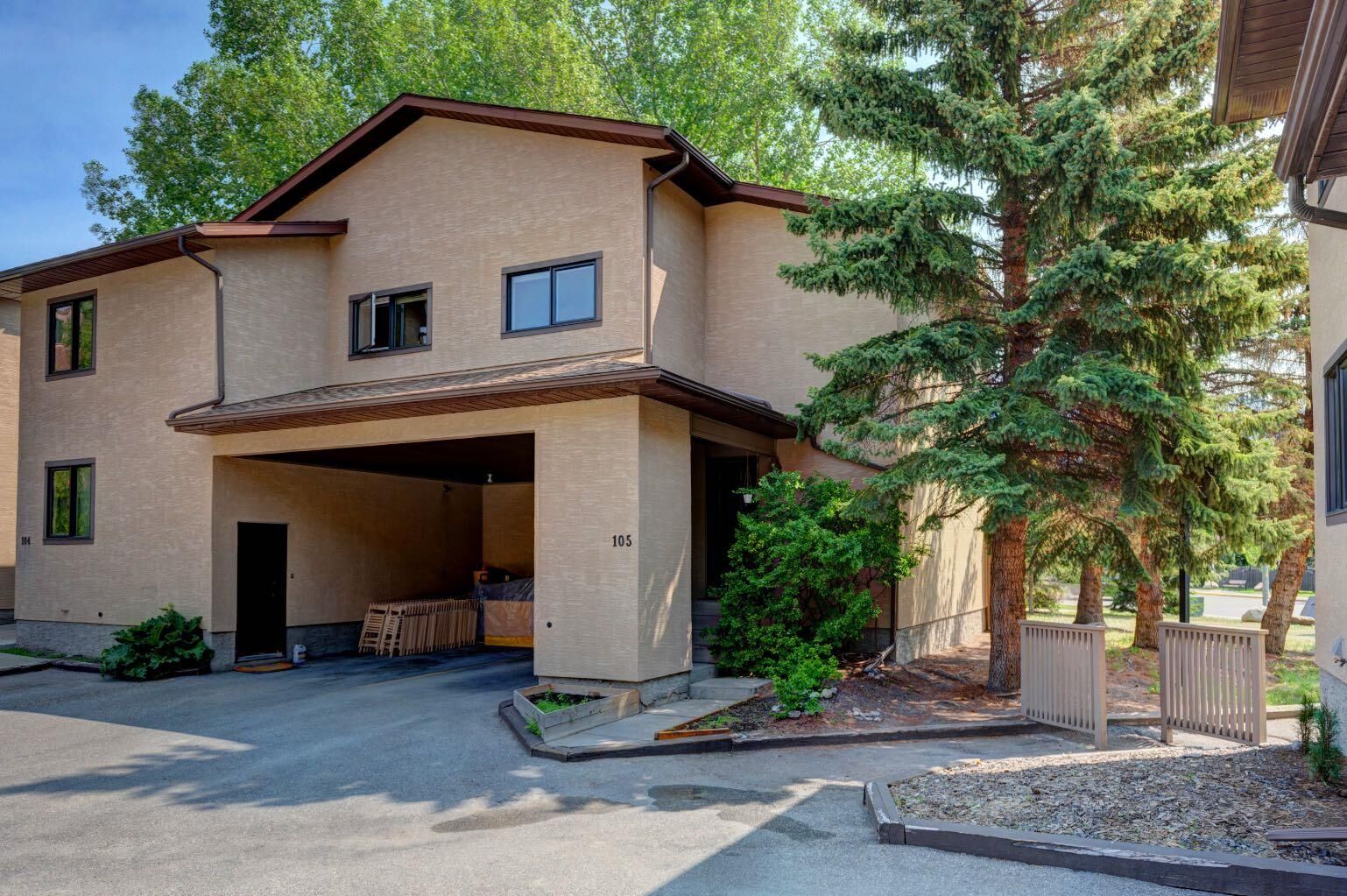 Property Photo:  200 Three Sisters Drive 105  AB T1W 2M1 