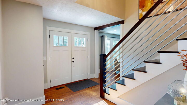 Property Photo:  2020 Tamarack Drive  MI 48864 