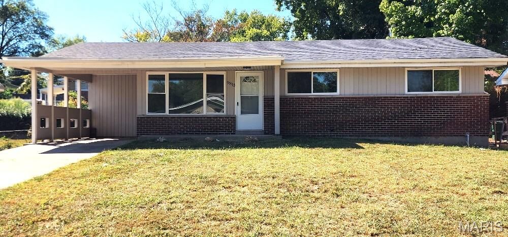 Property Photo:  9815 Portage Drive  MO 63136 