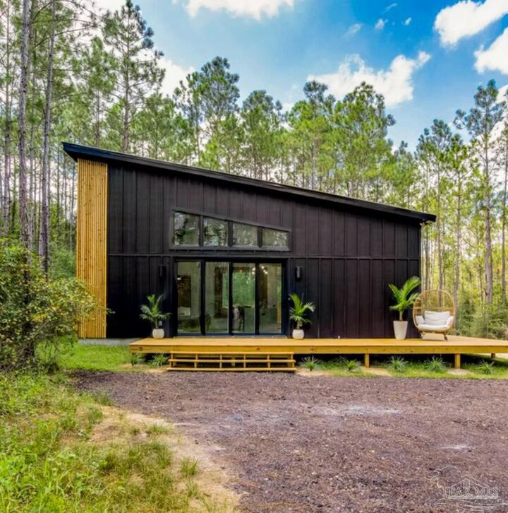 Property Photo:  5791 Whispering Woods Dr  FL 32571 