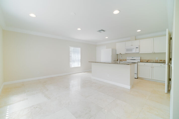 Property Photo:  6410 N Dixie Highway  FL 33487 