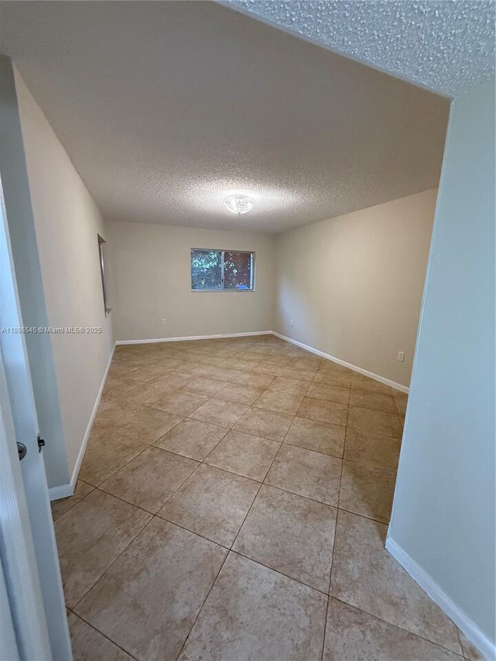 Property Photo: 900 SW 142nd Ave 101L FL 33027