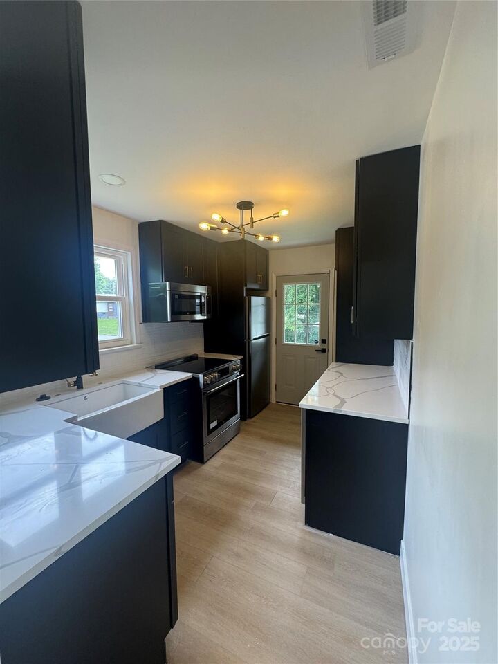 Property Photo:  1448 Academy Street  NC 28205 