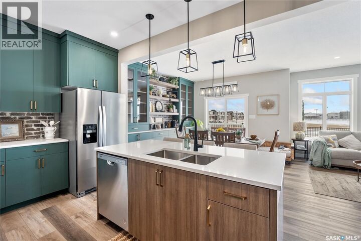 Property Photo:  207 Fortosky Crescent  SK S7M 5X3